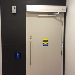 QUAD door handicap button